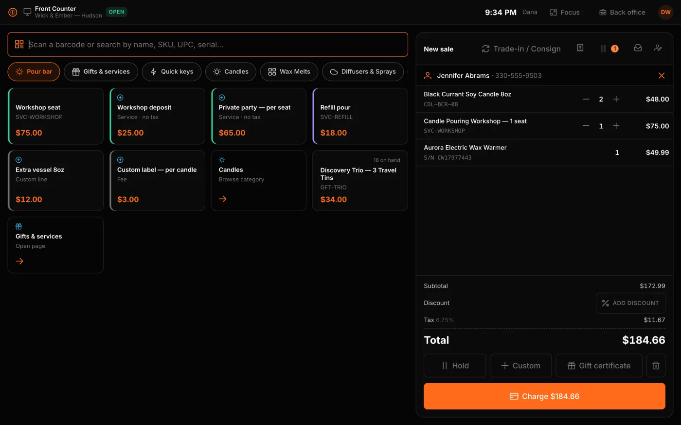 Black Beach POS demo with retail products, a workshop booking, and a serialized appliance in the cart